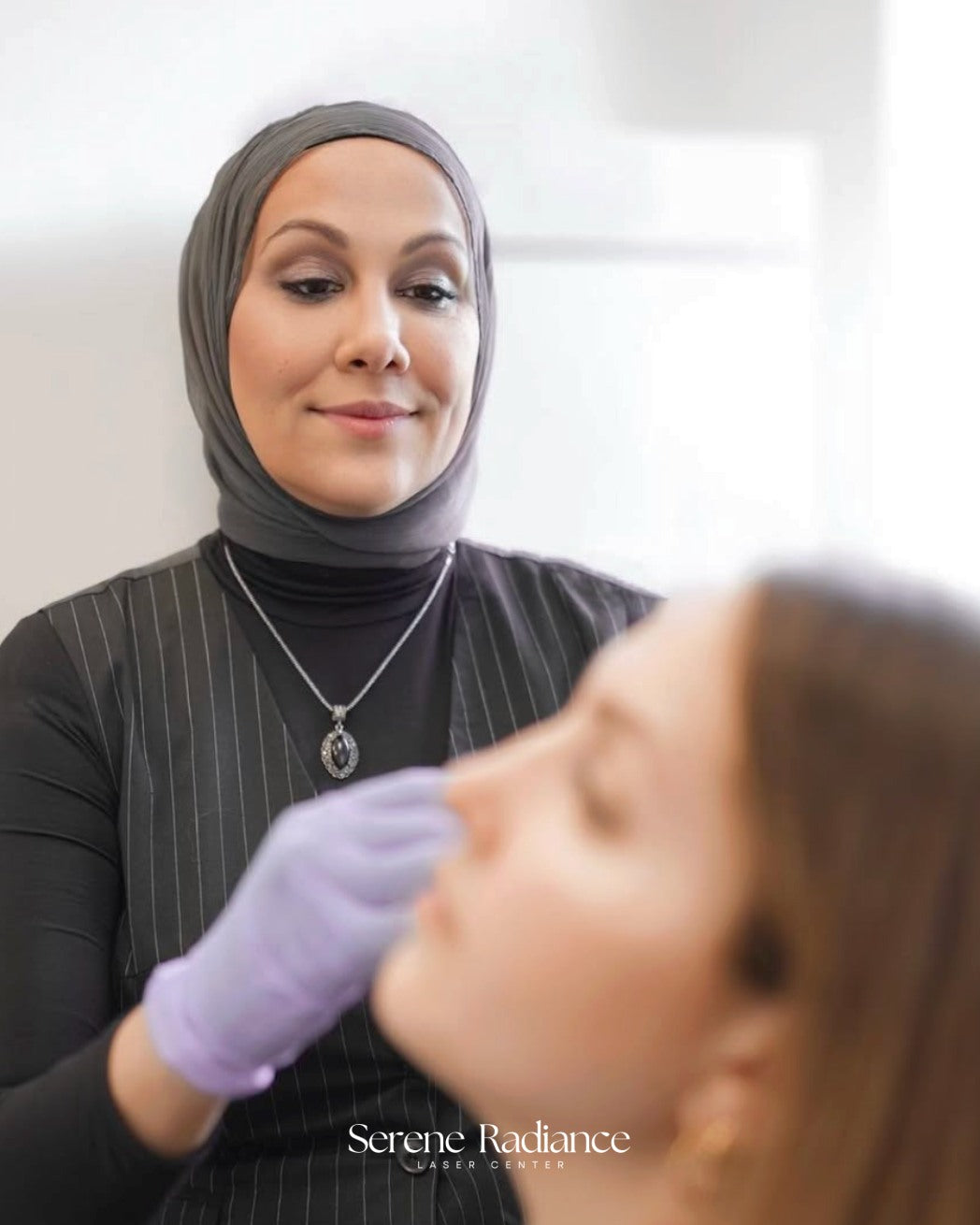 Dr. Sahar Moussa discussing personalized Botox treatment options with a patient at Serene Radiance in Edmonton